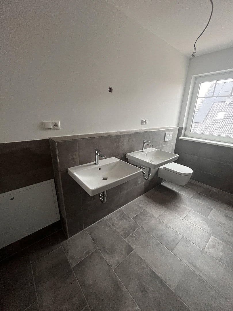 Predaj domu 126 m², pozemok 540 m², Unter den Linden 28 a + c, Stelle, Dolné Sasko Predaj domu 126 m², pozemok 540 m², Unter den Linden 28 a + c, Stelle, Dolné Sasko