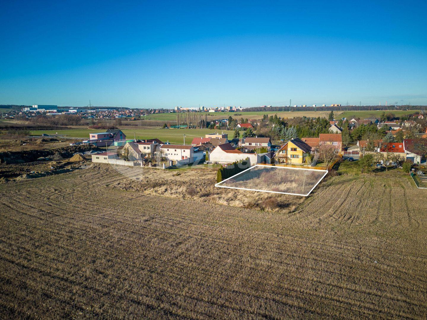 Predaj pozemku 800 m², Dolany, Středočeský kraj
