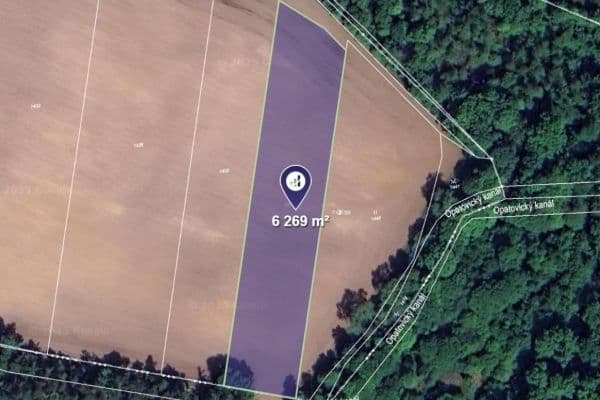Predaj pozemku 3.135 m², Dolany Predaj pozemku 3.135 m², Dolany